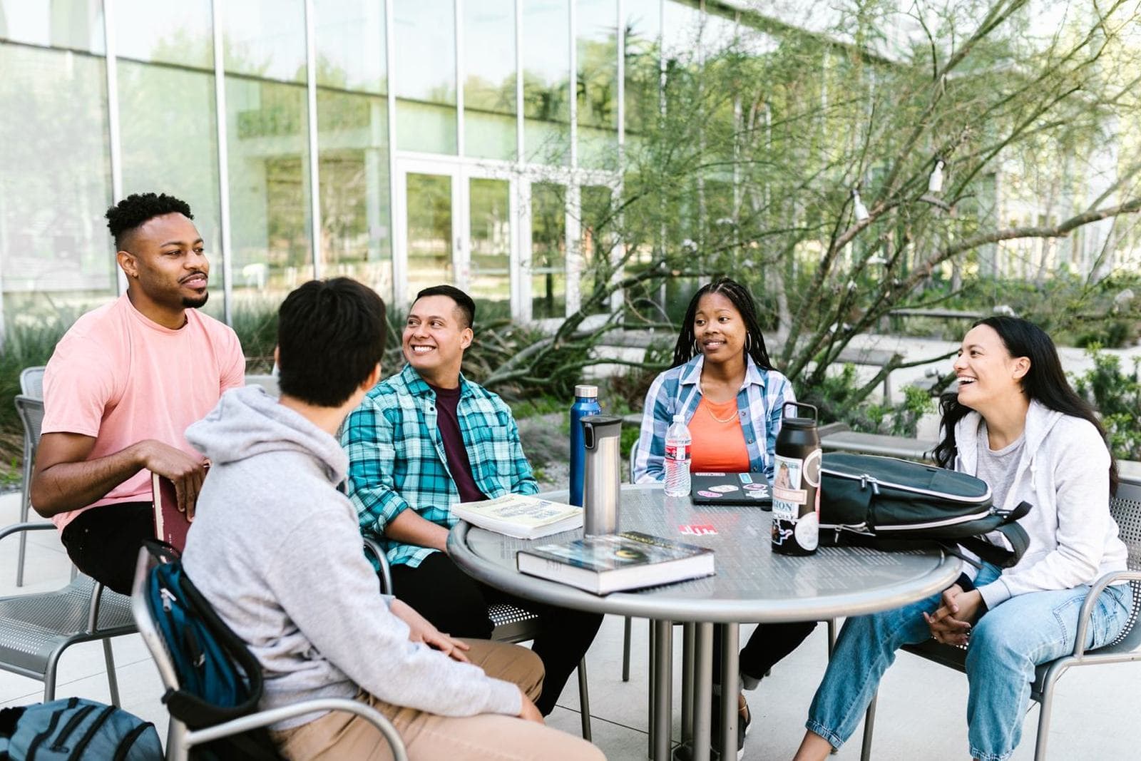 A small group of students together on campus or in a lounge